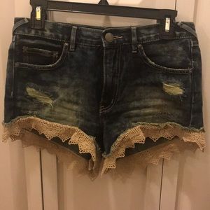 Free People distressed denim jean shorts